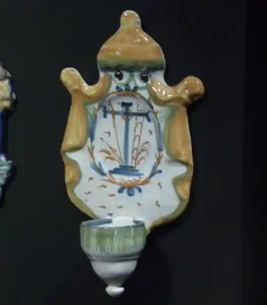 Panel with a cross inside an oval and veil